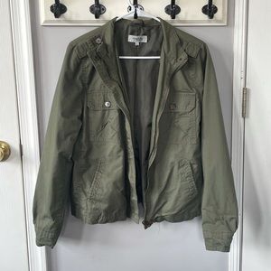 green jacket with embroidery detail